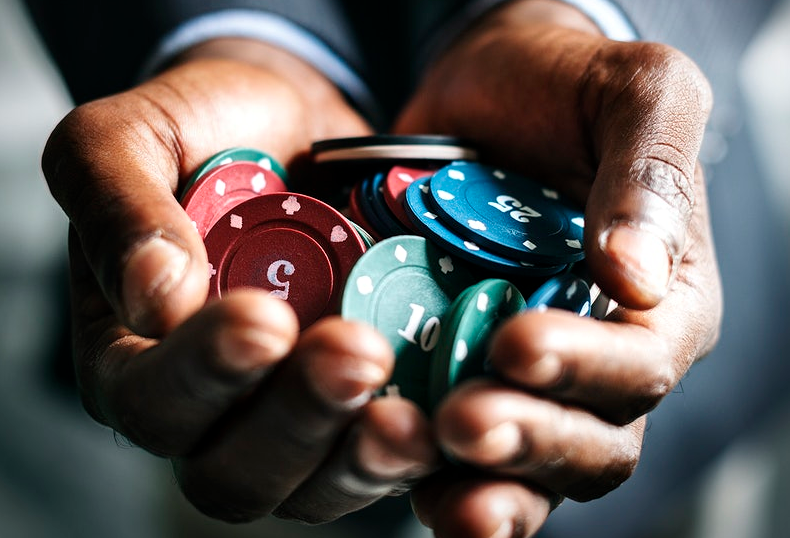 handing out casino tokens
